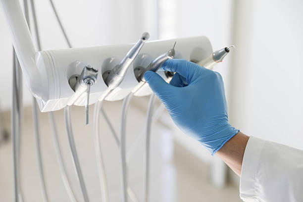 Professional Tooth Extraction technician working in Aurora, IL